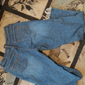Chico Platinum frayed bottom jeans.